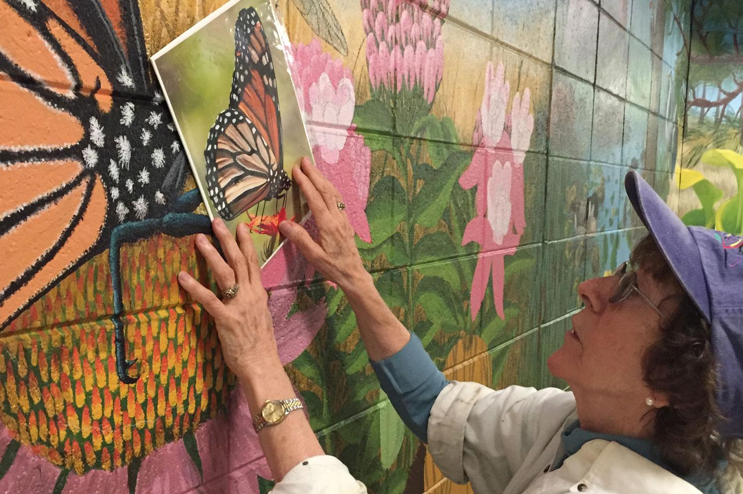 OC Puts Finishing Touch on Mural